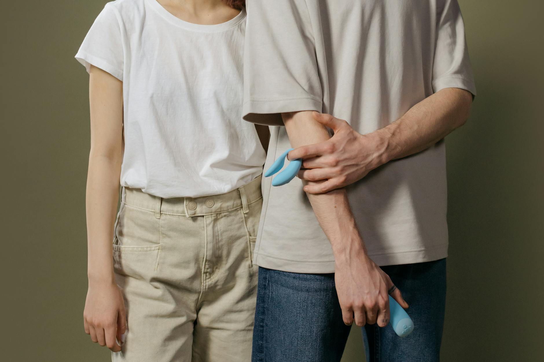 A couple exploring pleasure together with modern intimacy tools